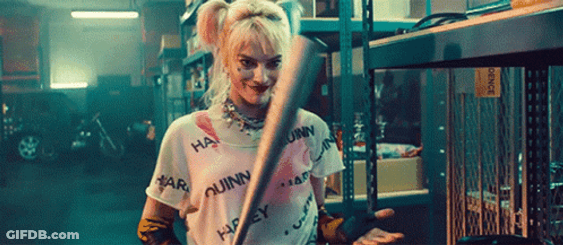 Harley Quinn Grin Holding Baseball Bat GIF