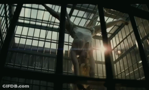 Harley Quinn Holding Smiley Mallet GIF