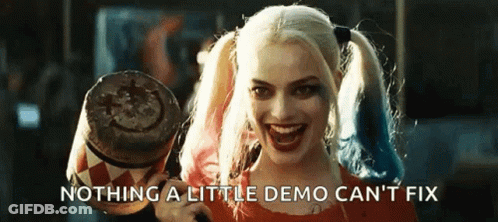 Harley Quinn Holding Smiley Mallet GIF