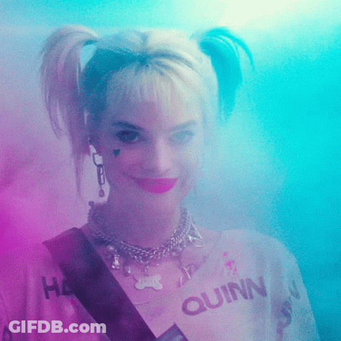 Harley Quinn Is Wearing A Shirt That Says Quinn On The Front GIF