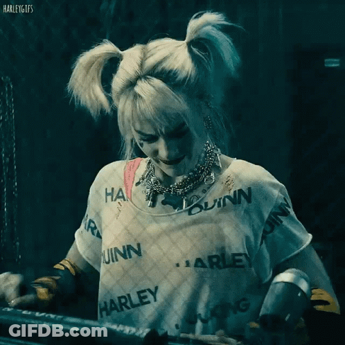 Harley Quinn Is Wearing A Shirt With Harley Quinn Written On It GIF