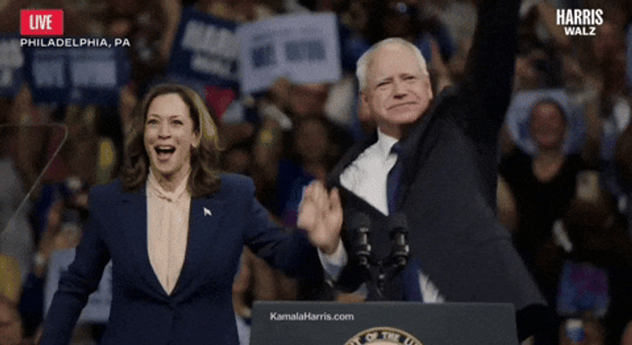 Harris Walz Hold Hand Waiving GIF