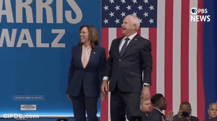 Harris Walz Raise Hands Waives GIF