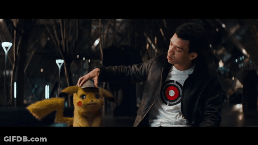 Harry Goodman Fixing Cap Of Detective Pikachu GIF