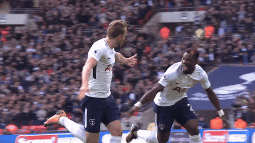 Harry Kane Laughing And Running With Teammate GIF