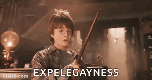 Harry Potter Is Holding A Wand In A Dark Room And Saying Expelegayness . GIF