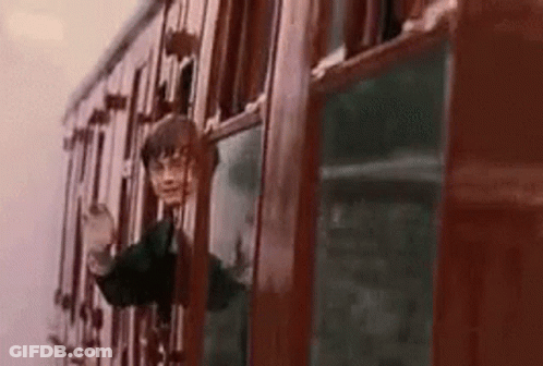 Harry Potter Is Looking Out Of A Train Window While Riding A Train . GIF