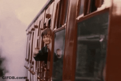 Harry Potter Is Riding A Train And Looking Out The Window . GIF