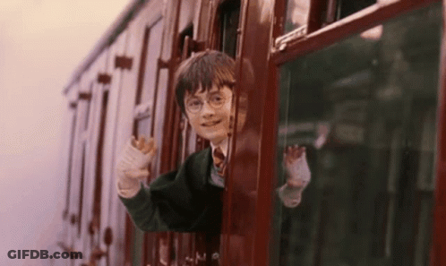 Harry Potter Is Riding A Train And Waving Out Of The Window . GIF