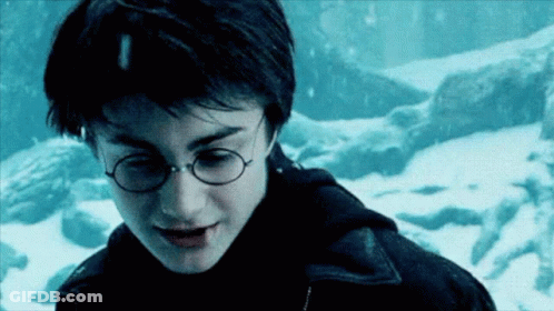 Harry Potter Is Wearing Glasses And A Black Jacket GIF