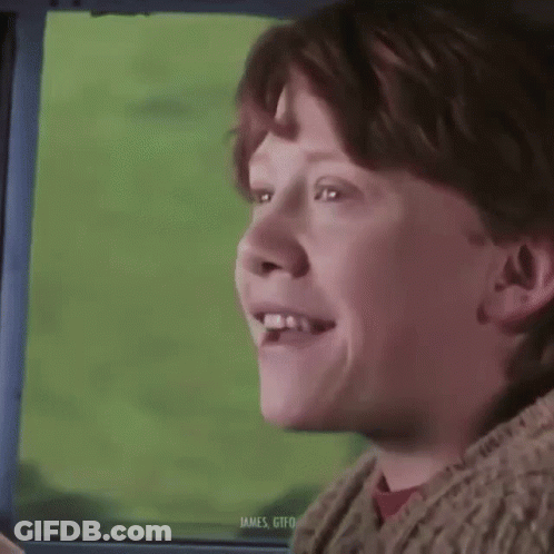 Harry Potter Is Wearing Glasses And Looking Out The Window GIF