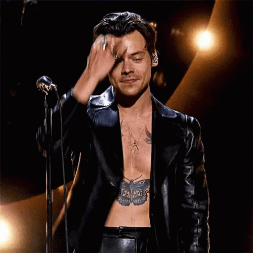 Harry Styles Hair Flip Tattoos GIF