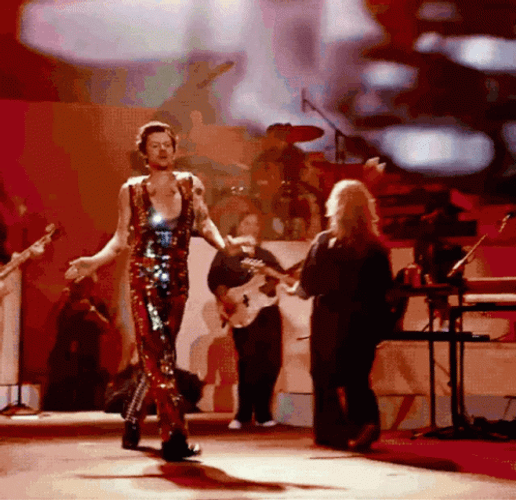 Harry Styles In Glamour Coachella Outfit GIF