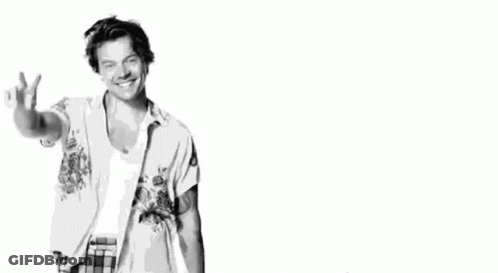 Harry Styles Wearing White Shirt And Plaid Pants GIF
