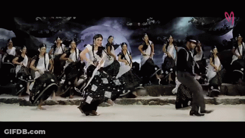 Hat Man Dancing With Women In Black White GIF
