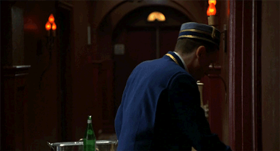Hat Tip Bell Boy Funny GIF