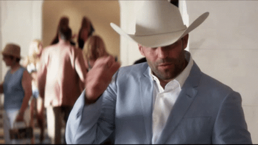 Hat Tip Jason Statham GIF