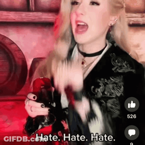 Hate Hate Hate Woman Mimicking The Grinch GIF