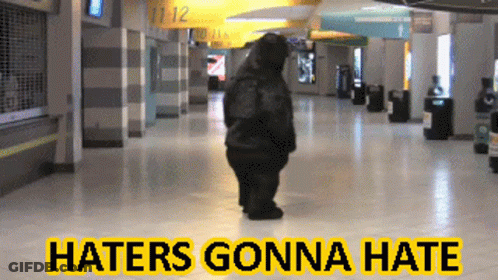 Haters Gonna Hate Sign With Bear GIF