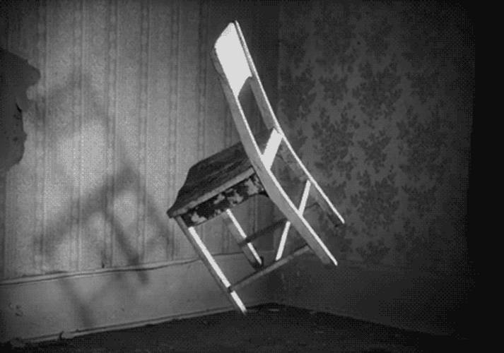 Haunted House Floating Spinning Chair GIF