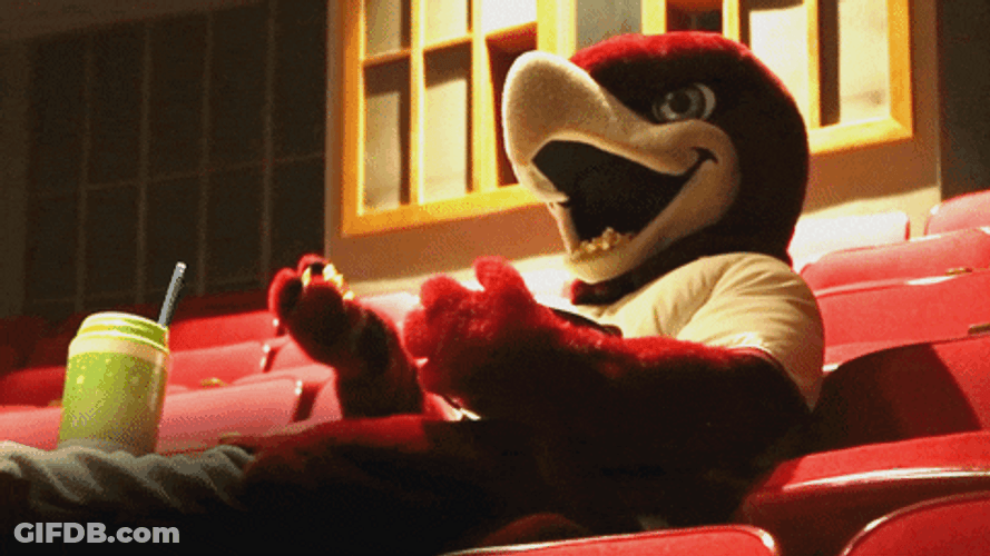 Hawk Mascot Eating Popcorn GIF