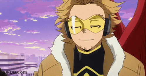 Hawks From My Hero Academia Is Wearing A Mask And Headphones While Standing In Front Of A City . GIF