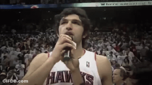 Hawks Player Singing Into Microphone GIF