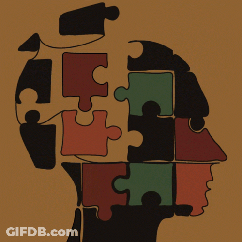 Head Made Of Jigsaw Puzzle Pieces GIF
