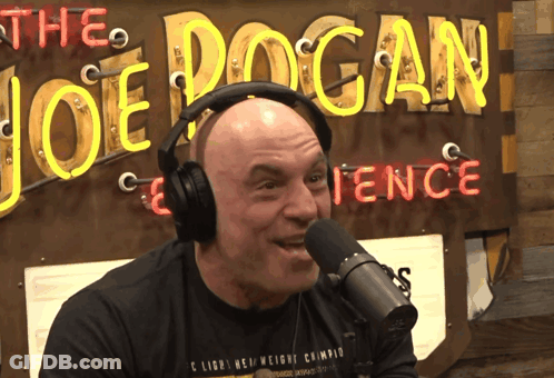 Headphones Man Talking Into Microphone Joe Logan Fence GIF