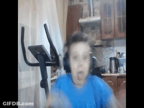 Headphones Person Next To Exercise Bike GIF