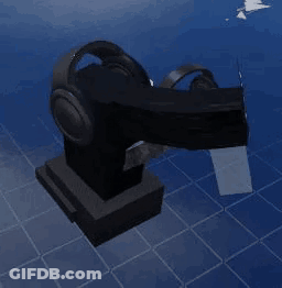 Headphones Sitting On Statue On Blue Tiled Floor GIF