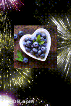 Heart Shaped Bowl Of Blueberries With Fireworks GIF