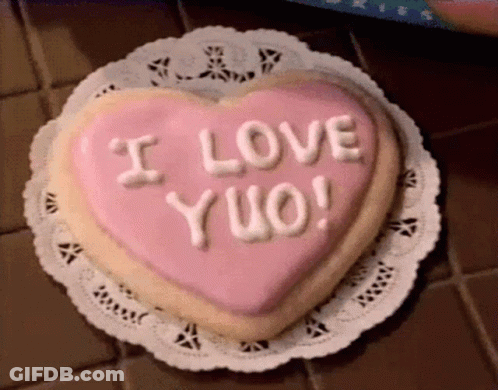 Heart Shaped Cookie Saying I Love Yuo GIF