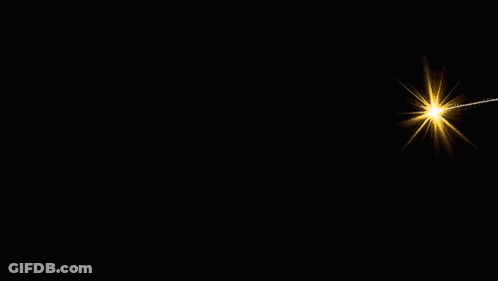 Heart Shaped Light On Black Background GIF