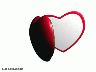 Heart Shaped Mirror Reflecting Man GIF