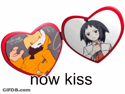 Heart Shaped Mirror With Two Men Saying Now Kiss GIF