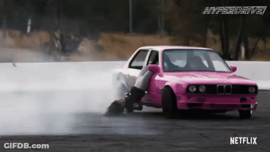 Hellcat Drifting With Woman Doing Stunts GIF