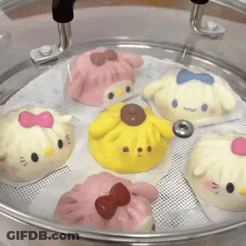 Hello Kitty And Pompompurin Dumplings In Steamer GIF