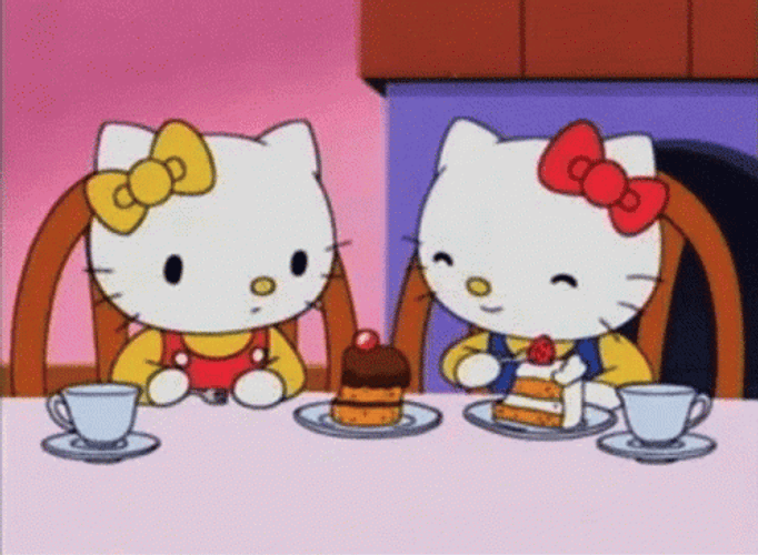 Hello Kitty Eating Cake GIF