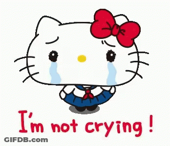 Hello Kitty Is Crying With Tears Running Down Her Face And The Words `` I 'M Not Crying '' Below Her . GIF