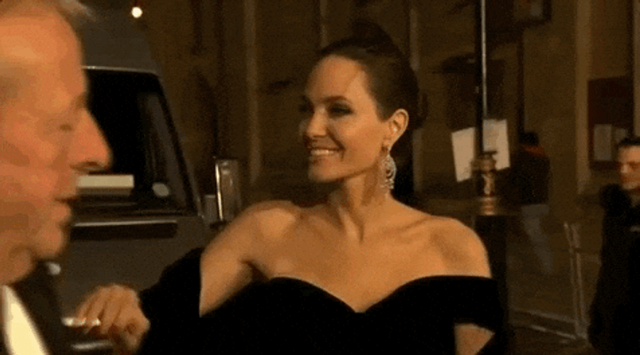 Hello Wave Of Angelina Jolie To Her Fans Outside GIF