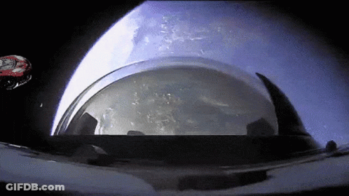 Helmet In Space With Rocket GIF