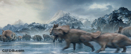 Herd Of Elephants Running Across Frozen Lake GIF