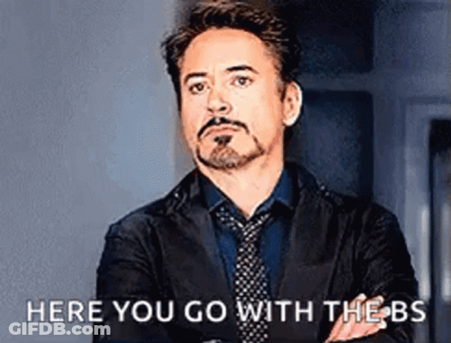 Here You Go Robert Downey Jr Frustrated GIF