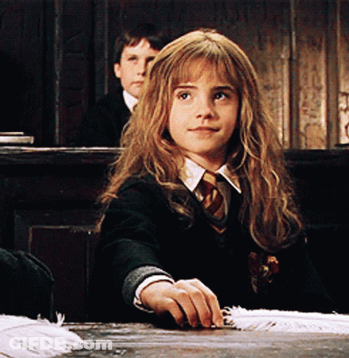 Hermione Putting Feather Down GIF