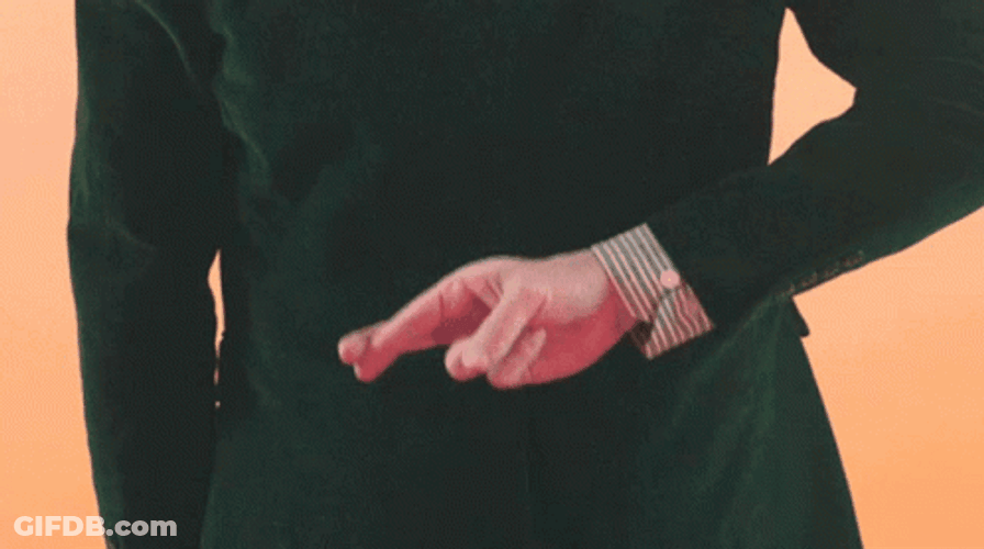 Hiding Cross Fingers GIF