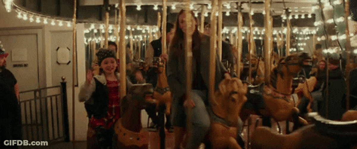 High Five On Merry Go Round GIF
