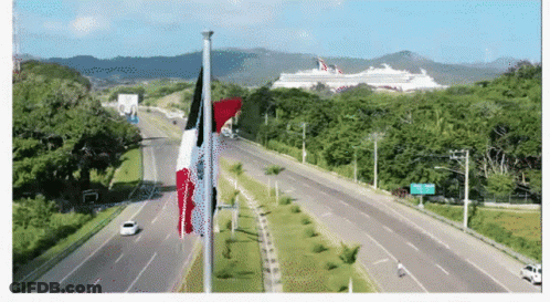 Highway With Cruise Ship And Flag GIF