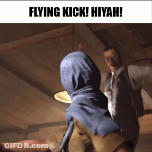 Hijabi Woman Flying Kick Hiyah Kicks Man Suit GIF