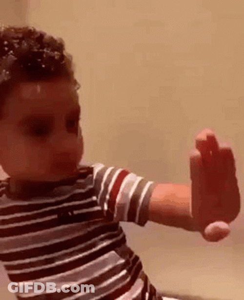 Hilarious Kid Inspecting Own Hand GIF